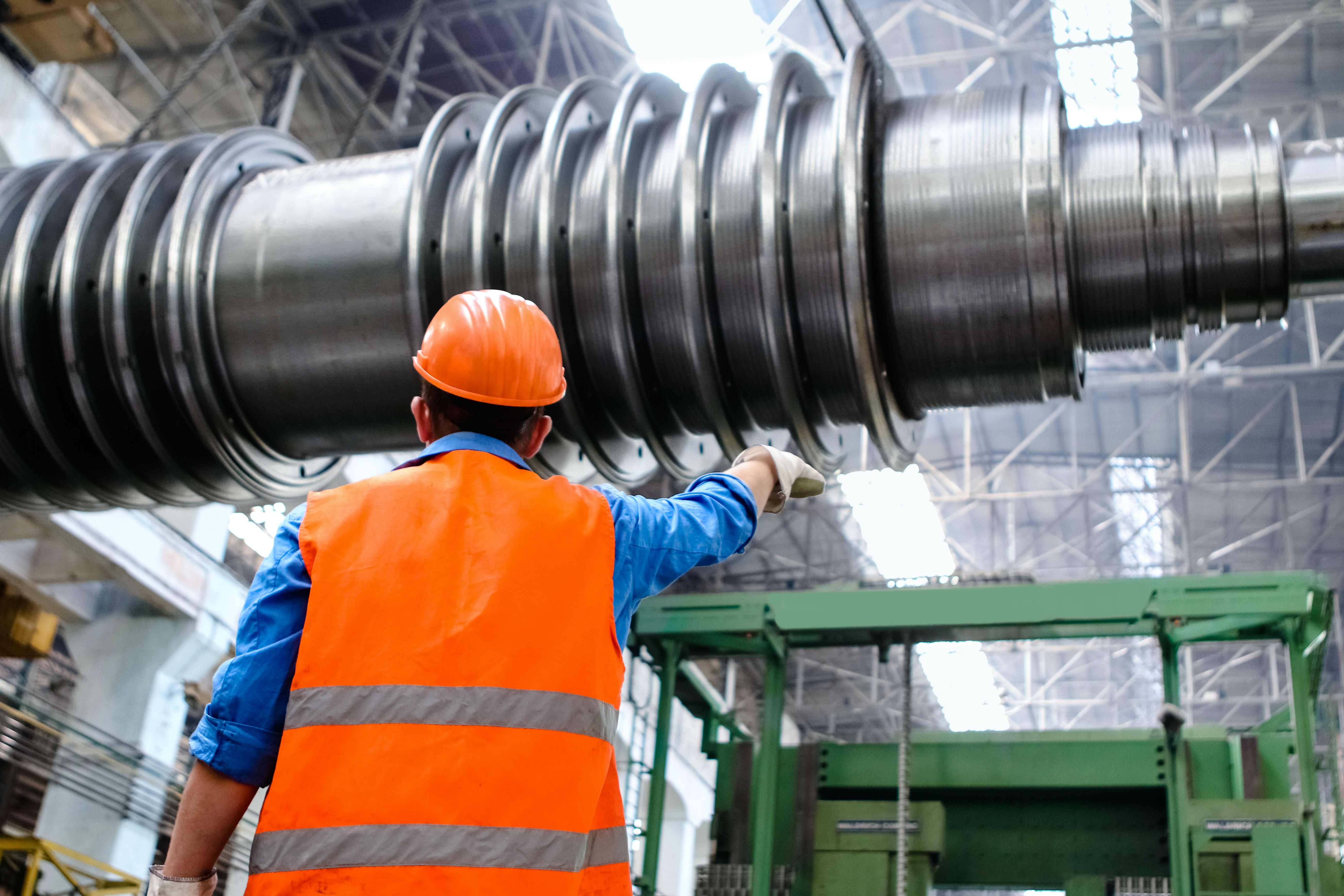 A chemical engineer inspecting a plant unit.